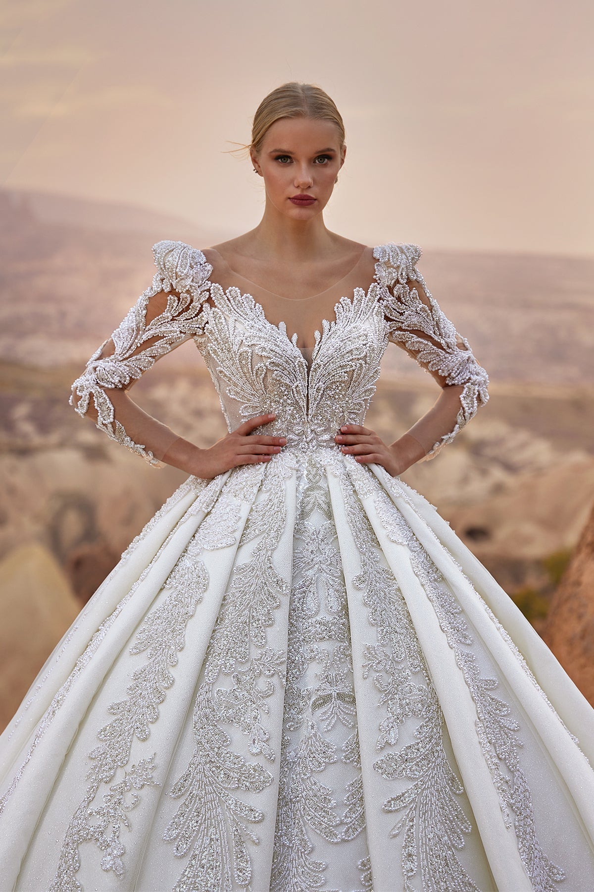 Derin V Yaka Vatkalı İllüzyon Kollu Kristal Barok Aplike Saten Prenses Gelinlik | Annabella Bridal - Annabella Bridal – Modern ve Zamansız Gelinlik Tasarımları - Annabella